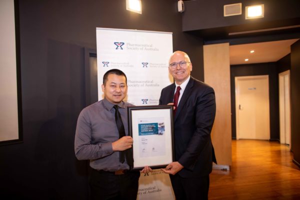 The Hon David Pisoni MP presents the SA:NT Pharmacist of the Year Award to Dr Danny Tsai