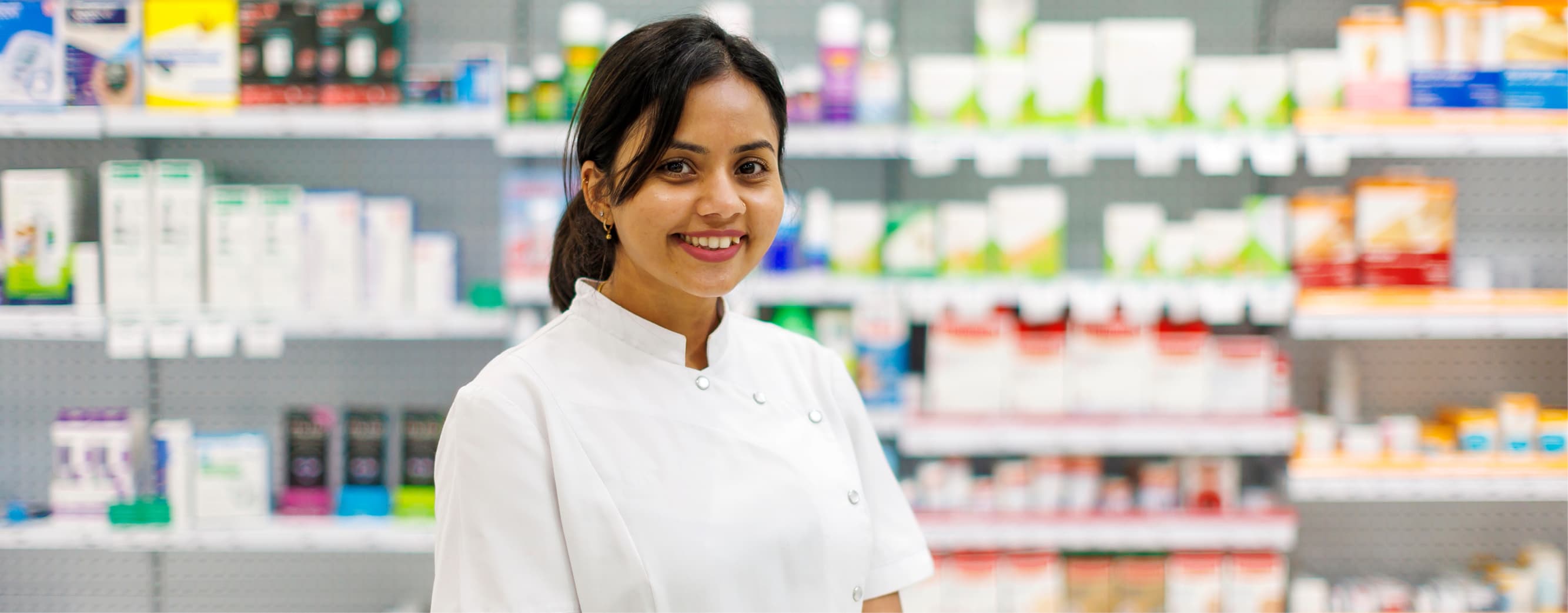 Essential membership hero tile, young pharmacist